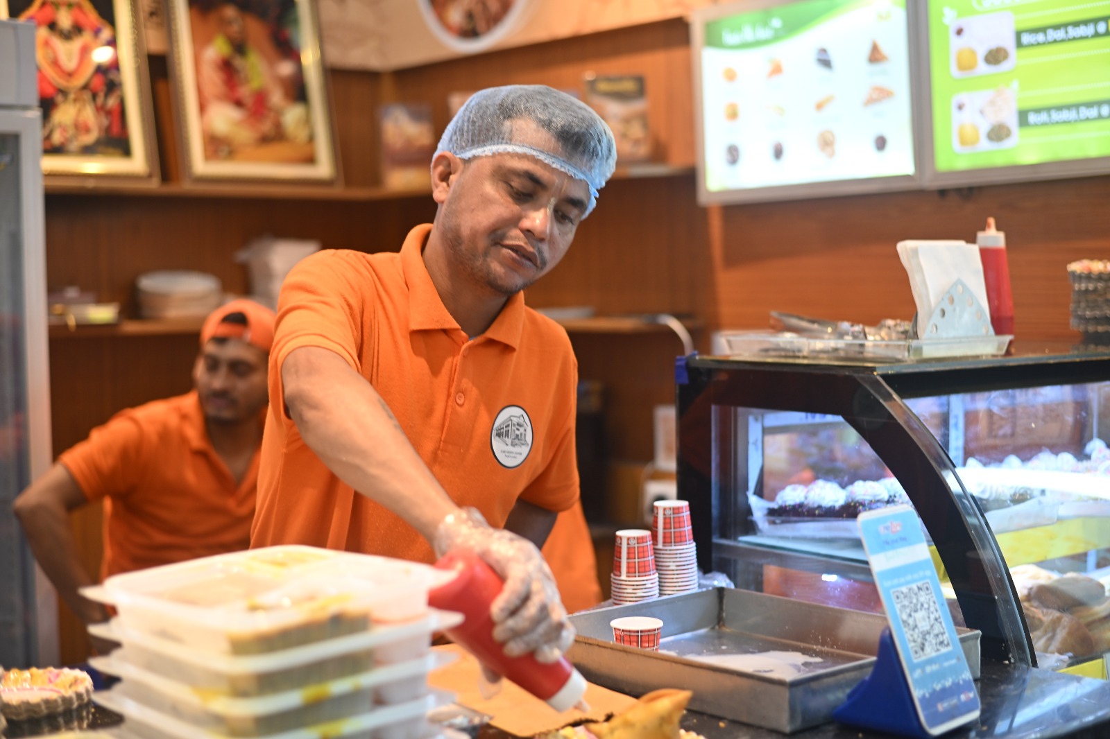 Volunteer preparing food